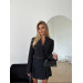 A trendy 2-piece suit, a skirt-shorts and a cropped jacket is your perfect option