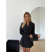 A trendy 2-piece suit, a skirt-shorts and a cropped jacket is your perfect option