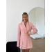 A trendy 2-piece suit, a skirt-shorts and a cropped jacket is your perfect option