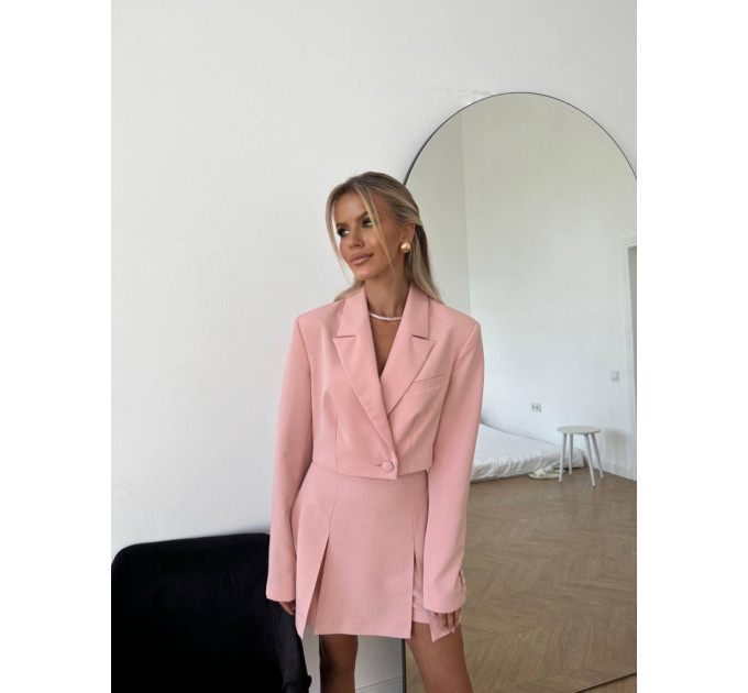 A trendy 2-piece suit, a skirt-shorts and a cropped jacket is your perfect option