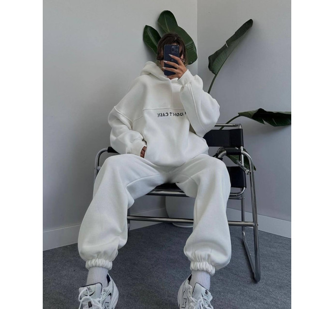 Stylish women's sports suit with fleece “I DON'T CARE” and various colors (Sizes 42-52)