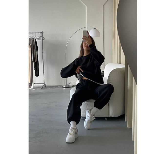 Stylish women's sports suit with an oversized cut