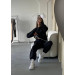 Stylish women's sports suit with an oversized cut