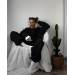 Stylish women's sports suit with an oversized cut