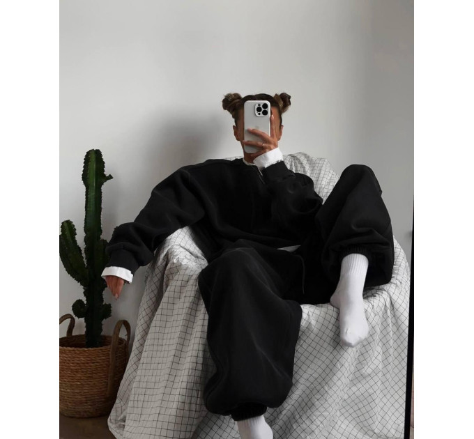 Stylish women's sports suit with an oversized cut