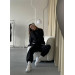 Stylish women's sports suit with an oversized cut