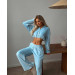 Soft women's velour tracksuit in various colors