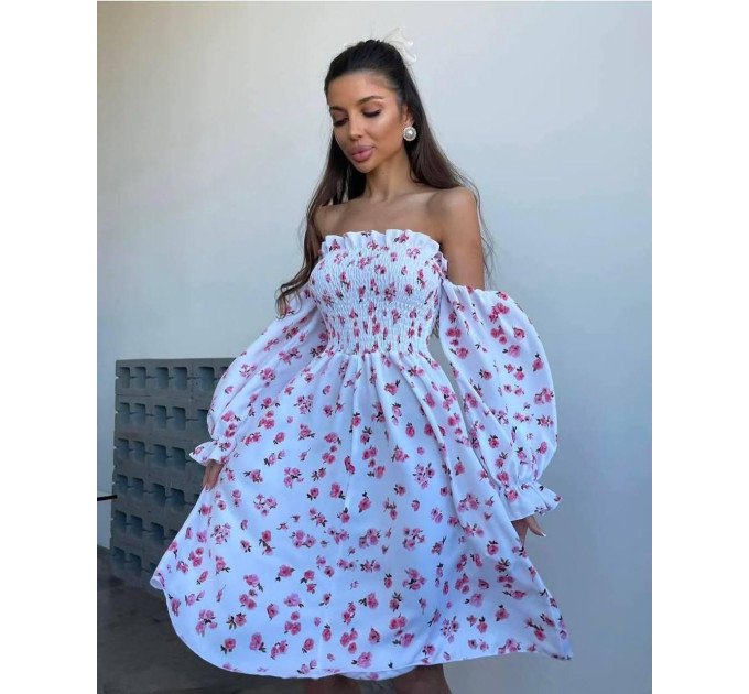 Incredibly delicate women's dress with a floral print
