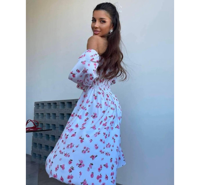 Incredibly delicate women's dress with a floral print