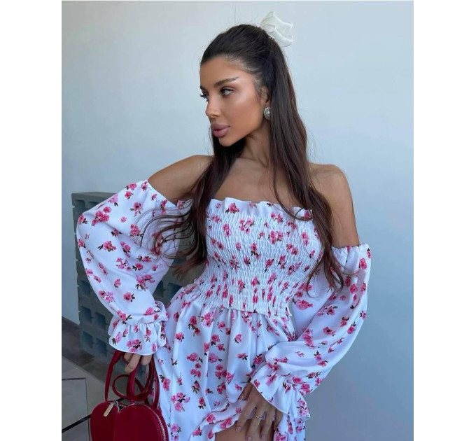 Incredibly delicate women's dress with a floral print