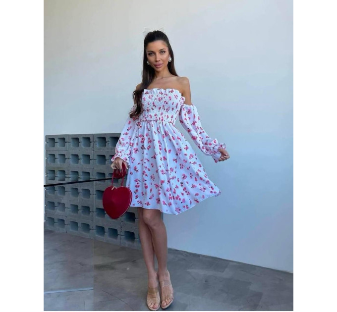 Incredibly delicate women's dress with a floral print