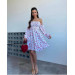 Incredibly delicate women's dress with a floral print