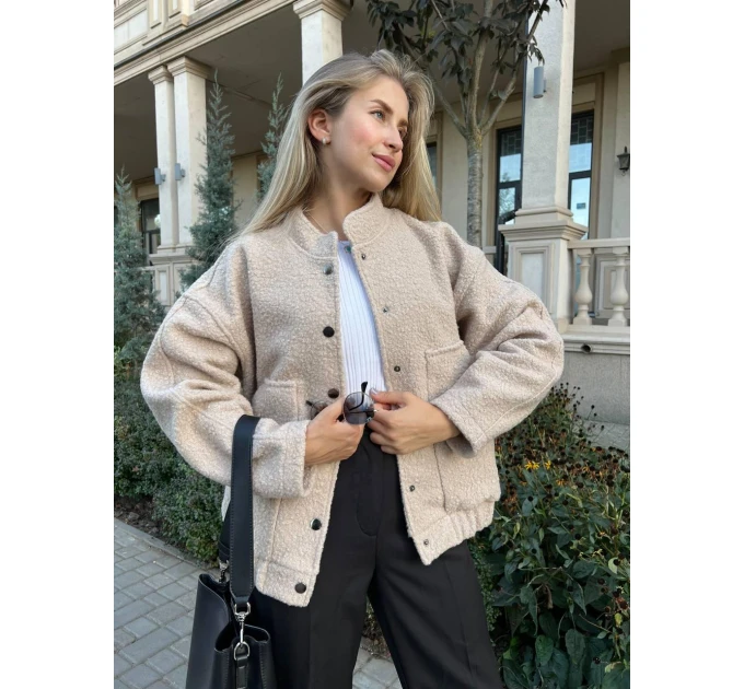 An incredibly cool women's bomber jacket made of trendy soft fabric in basic autumn colors!