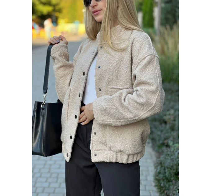 An incredibly cool women's bomber jacket made of trendy soft fabric in basic autumn colors!