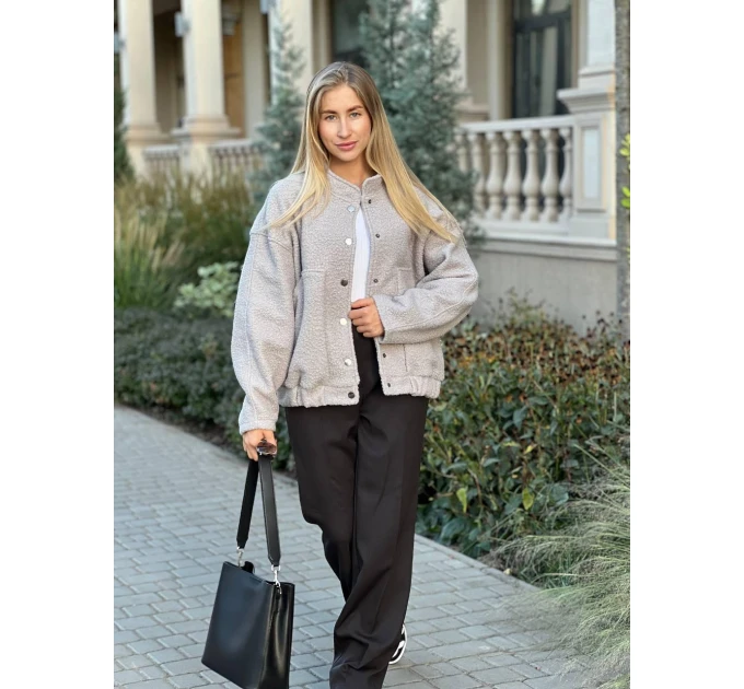 An incredibly cool women's bomber jacket made of trendy soft fabric in basic autumn colors!