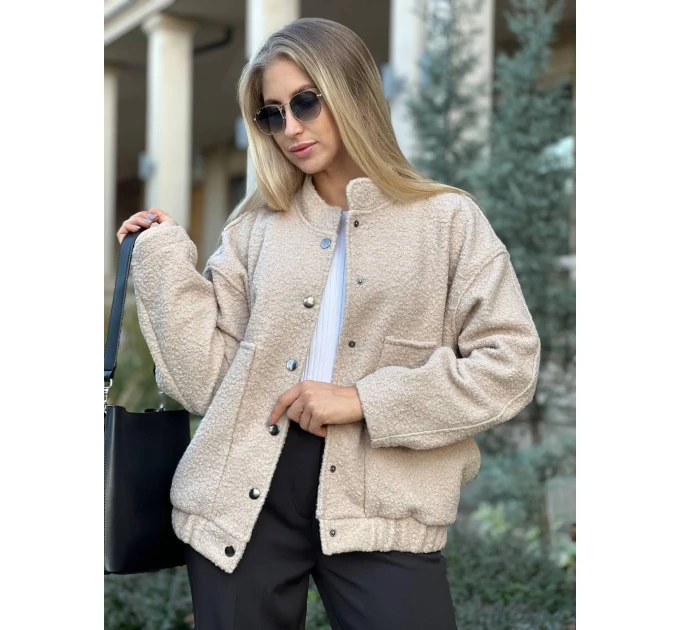 An incredibly cool women's bomber jacket made of trendy soft fabric in basic autumn colors!