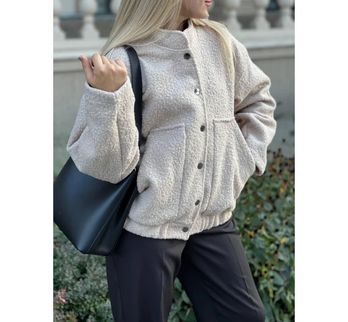 An incredibly cool women's bomber jacket made of trendy soft fabric in basic autumn colors!