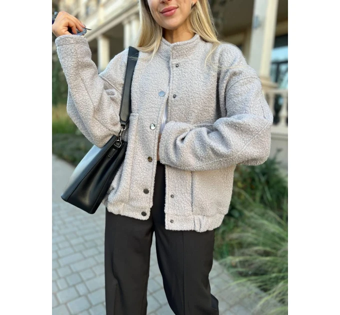 An incredibly cool women's bomber jacket made of trendy soft fabric in basic autumn colors!