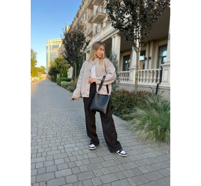 An incredibly cool women's bomber jacket made of trendy soft fabric in basic autumn colors!